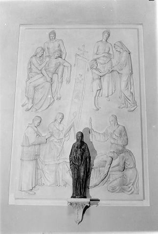 Opere della Misericordia (rilievo) di Guiggi Giulio (metà sec. XX)