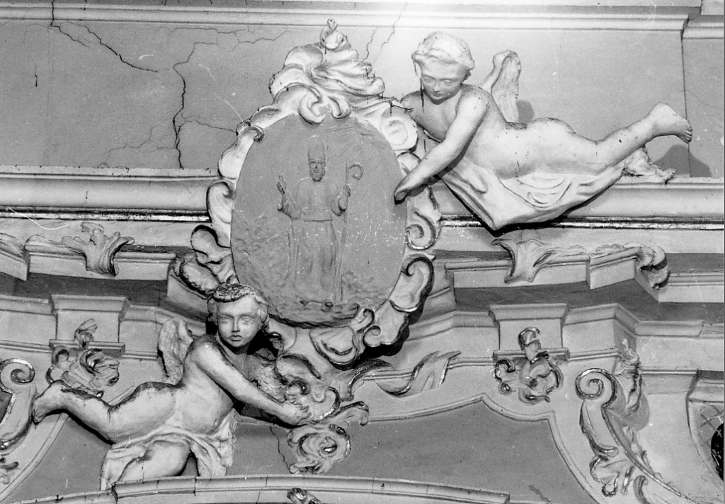Angeli reggiclipeo (rilievo) di Mambrini C (sec. XVIII)