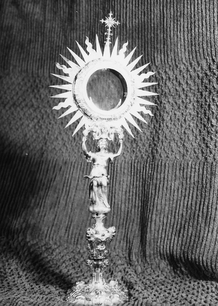 Angelo, testine angeliche, croce, motivi decorativi vegetali e a valve di conchiglia (ostensorio - a raggiera) - ambito Italia centrale (sec. XIX)