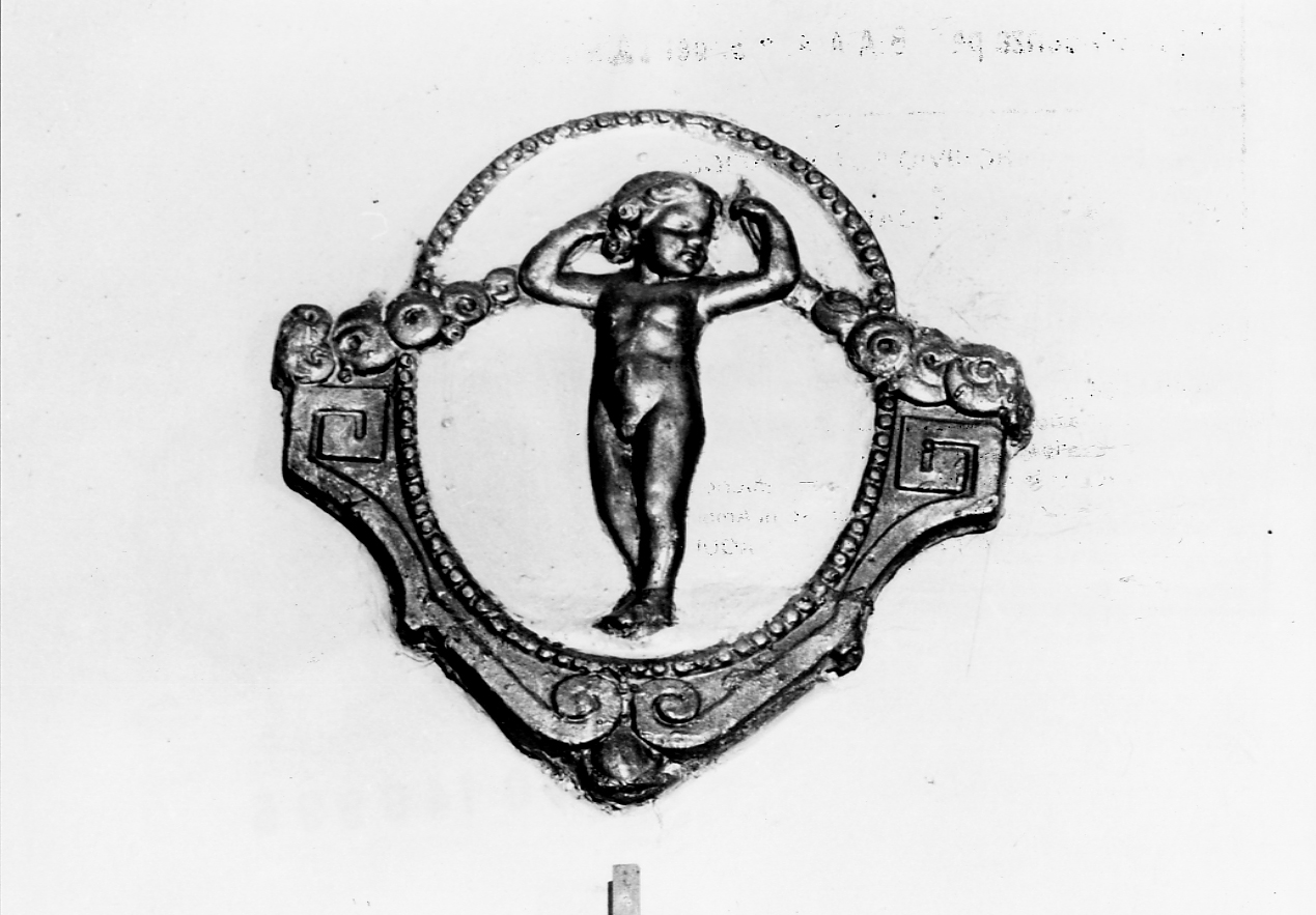 motivo decorativo a medaglioni con angioletto reggifestone, motivi decorativi (rilievo, serie) - bottega Italia centrale (secc. XVIII/ XIX)