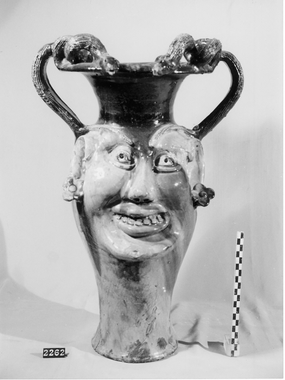 Testa femminile (vaso, ceramica) - produzione di Seminara (1961)