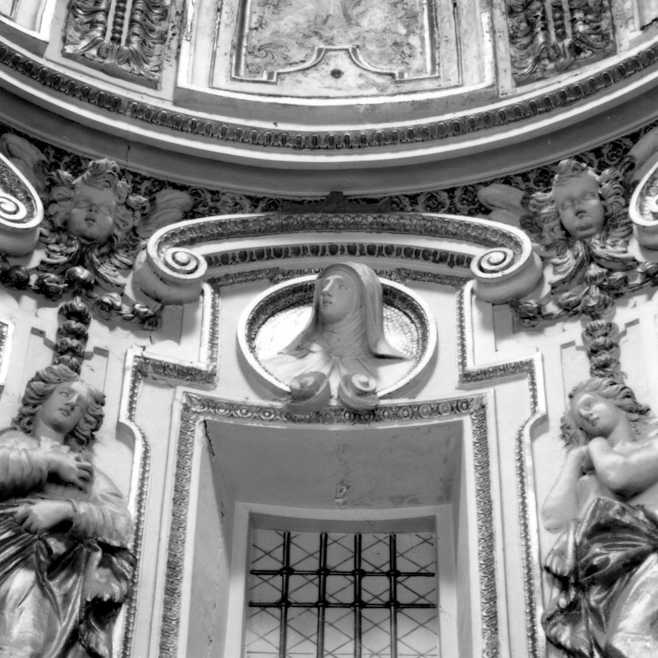 testa di Santa Teresa d'Avila (rilievo, serie) di Fanzago Cosimo (sec. XVIII)