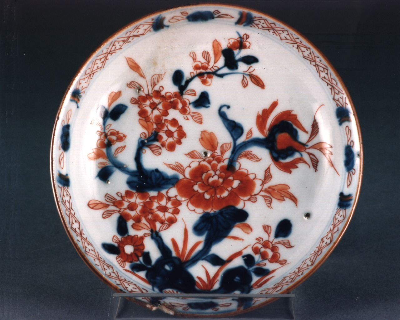 motivi decorativi floreali (piattino) - manifattura cinese (sec. XVIII)