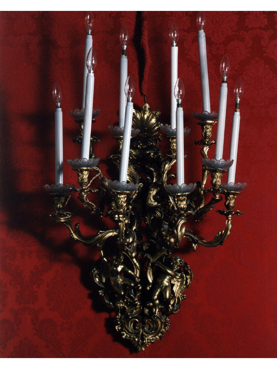 motivi decorativi vegetali con putti alati (candeliere da parete, serie) - bottega francese (seconda metà sec. XIX)