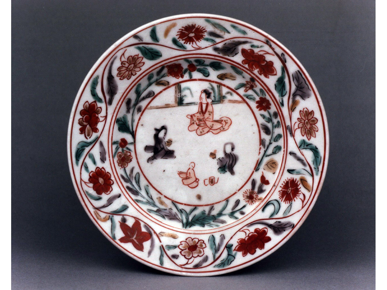 motivi decorativi vegetali e animali (piattino) - manifattura di Arita (secc. XVII/ XVIII)