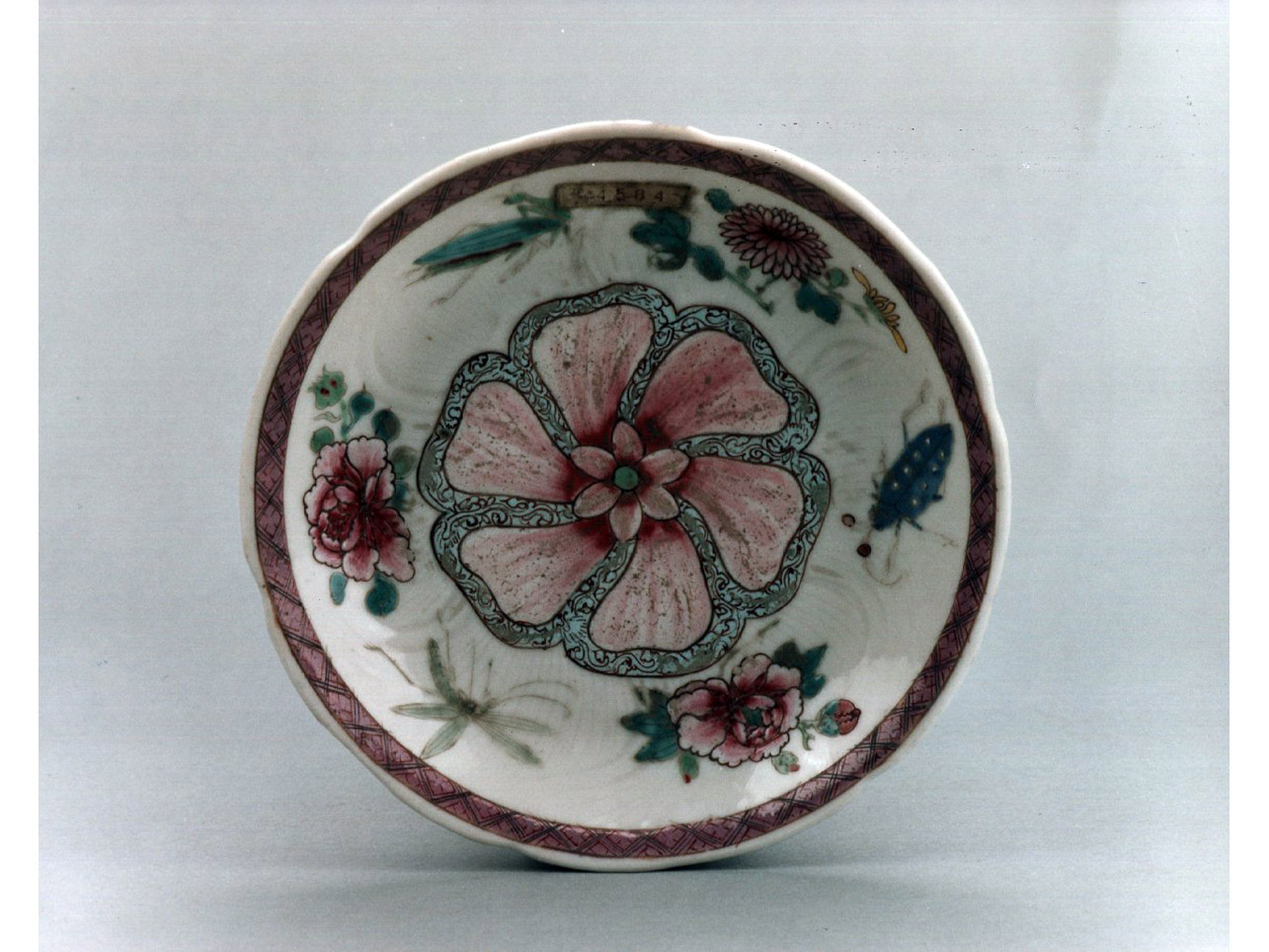motivi decorativi floreali (piattino) - manifattura cinese (sec. XVIII)