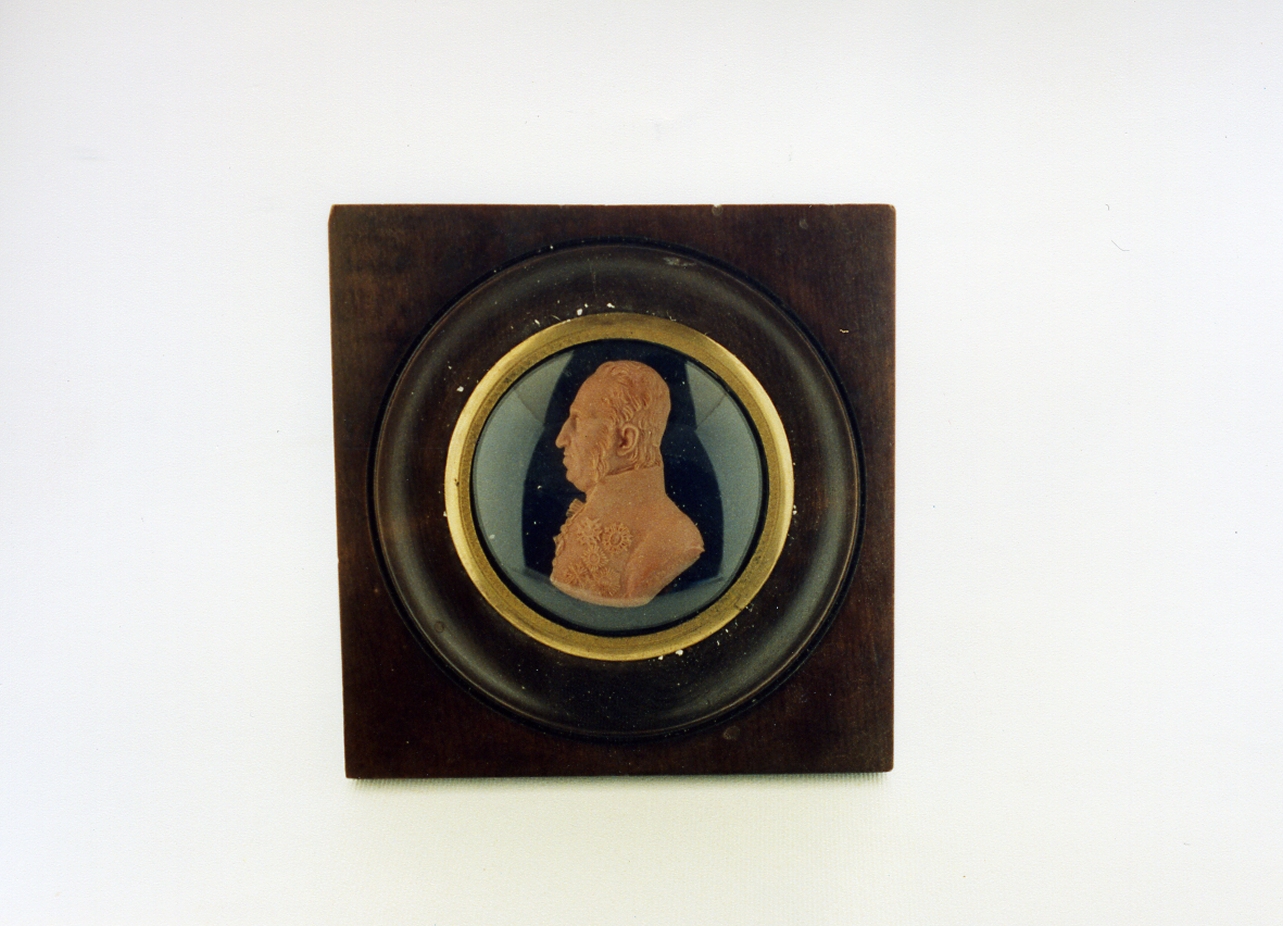 ritratto d'uomo di profilo (rilievo) di Pozzi Filippo (sec. XIX)