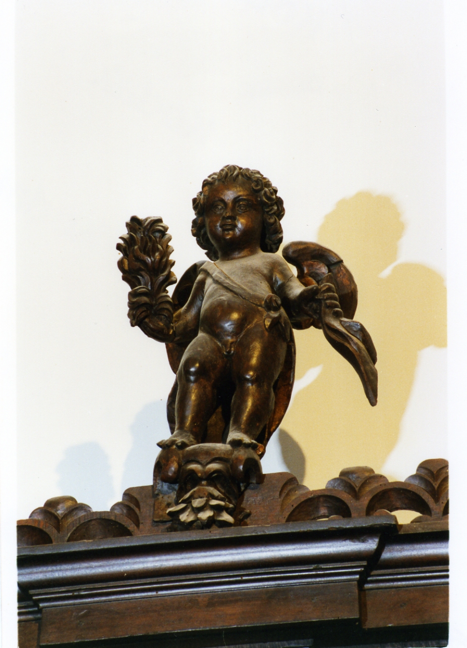 putto (cimasa) di Merliani Giovanni detto Giovanni da Nola (inizio sec. XVII)