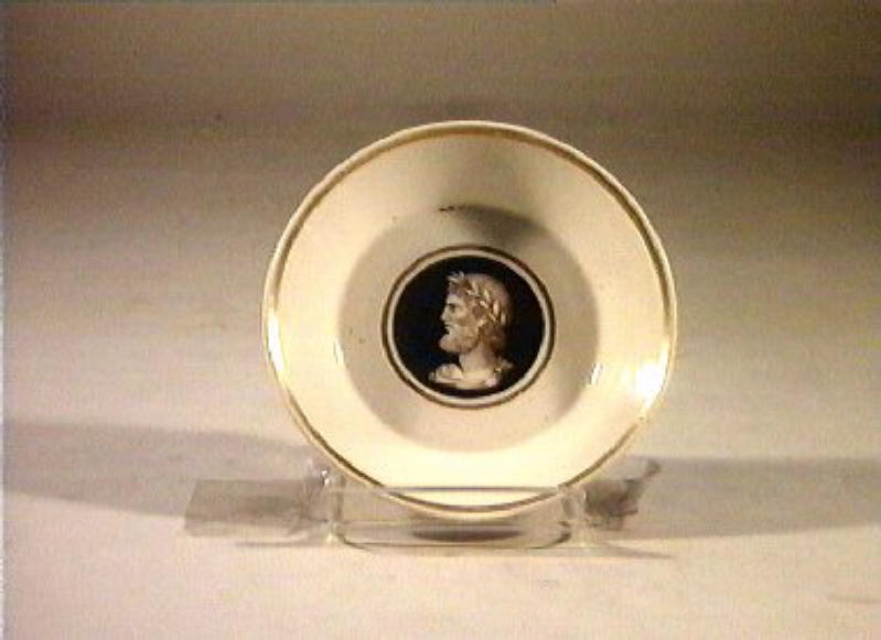 testa d'uomo (piattino) di Securo Francesco (sec. XIX)