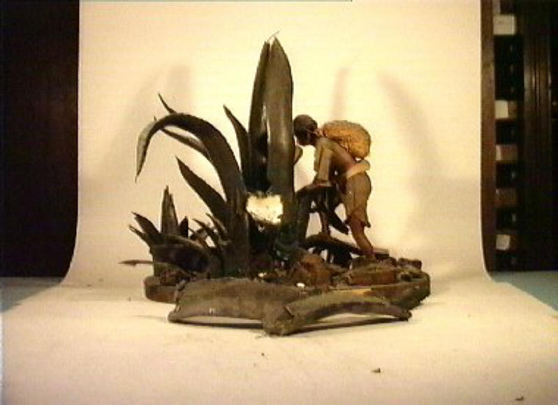 uomo che estrae il succo dalla pianta (gruppo scultoreo) - produzione messicana (sec. XIX)