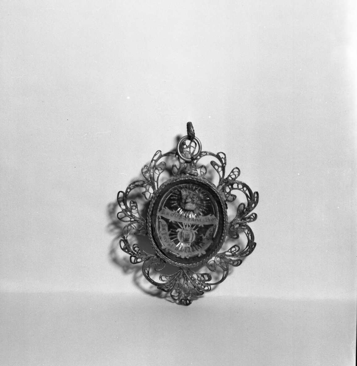 reliquiario a capsula - a medaglione - bottega italiana (sec. XVIII)