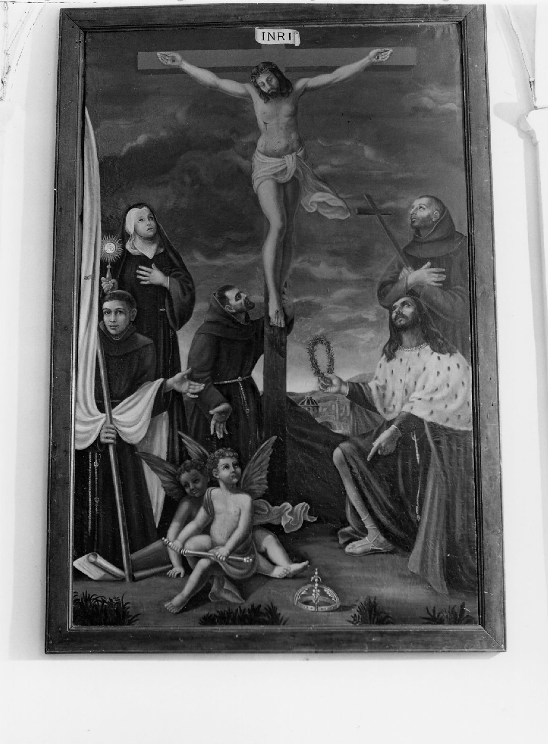 Il Crocifisso adorato dai i SS. Francesco d'Assisi, Pietro d'Alcantara, Chiara, Luigi di Francia, Giovanni da Capestrano e due angioletti (dipinto) - ambito emiliano-romagnolo (sec. XVII)