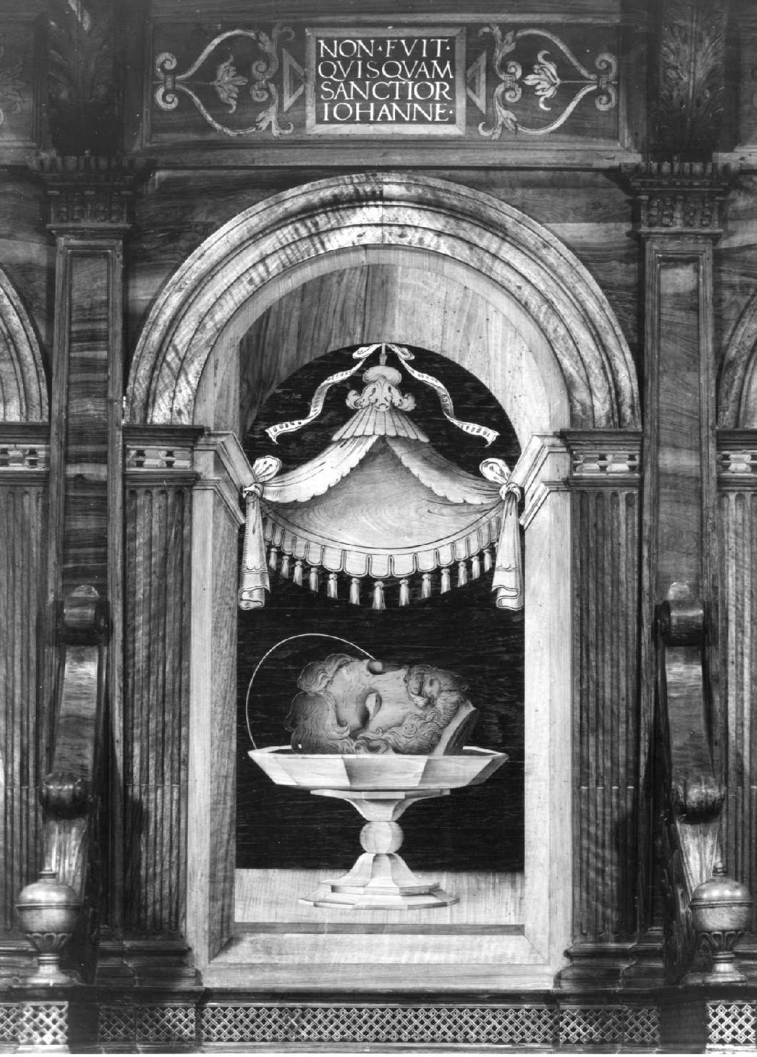 testa di San Giovanni Battista (decorazione a intarsio, elemento d'insieme) di De Marchi Biagio (sec. XVI)