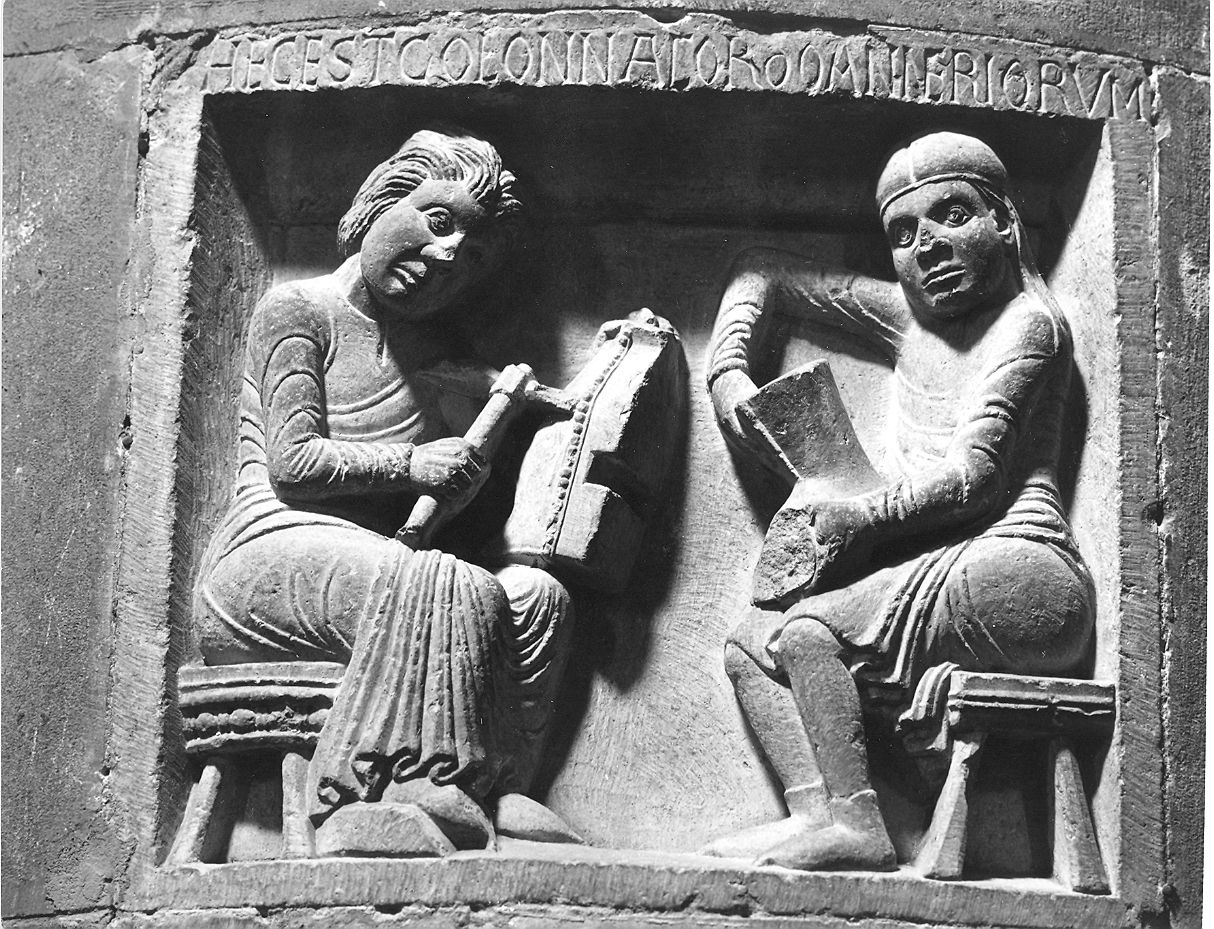 calzolai al lavoro (rilievo, elemento d'insieme) - bottega piacentina (terzo quarto sec. XII)