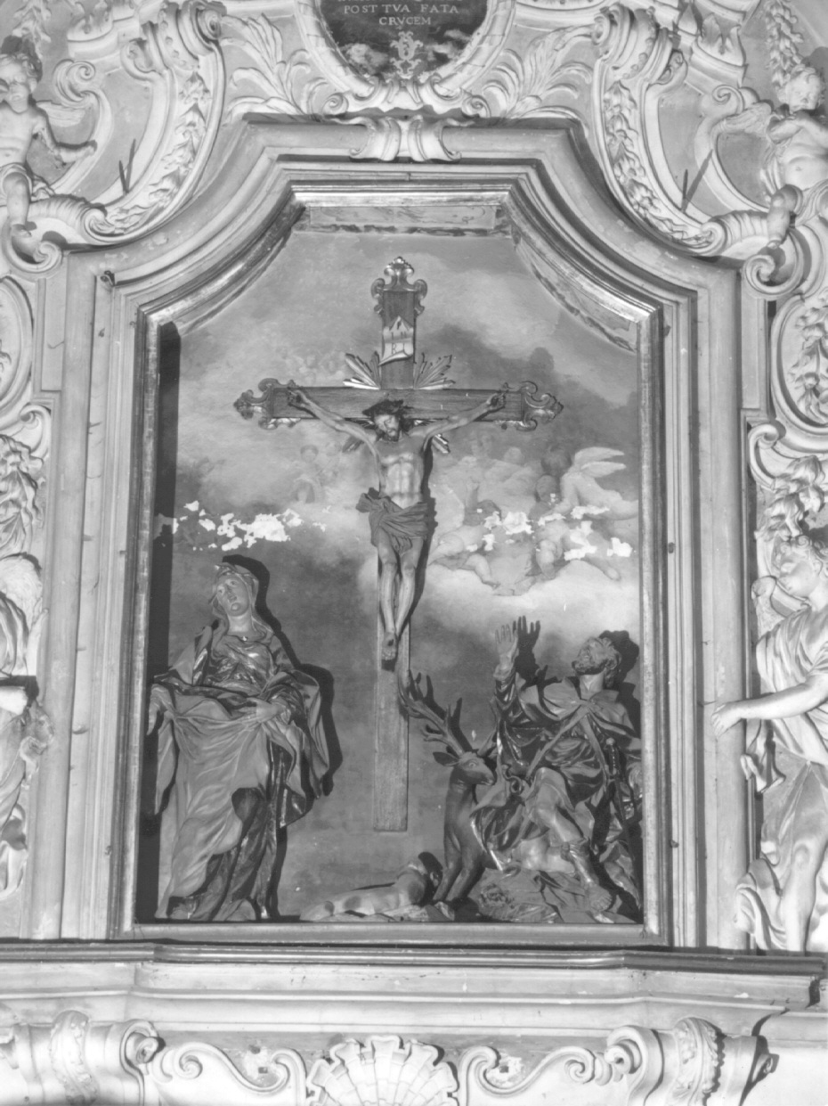 CROCIFISSIONE DI CRISTO CON LA MADONNA ADDOLORATA E SANT'EUSTACHIO (gruppo scultoreo) di Sceti Giovanni (attribuito) - ambito piacentino (primo quarto, metà sec. XVIII, sec. XVIII)
