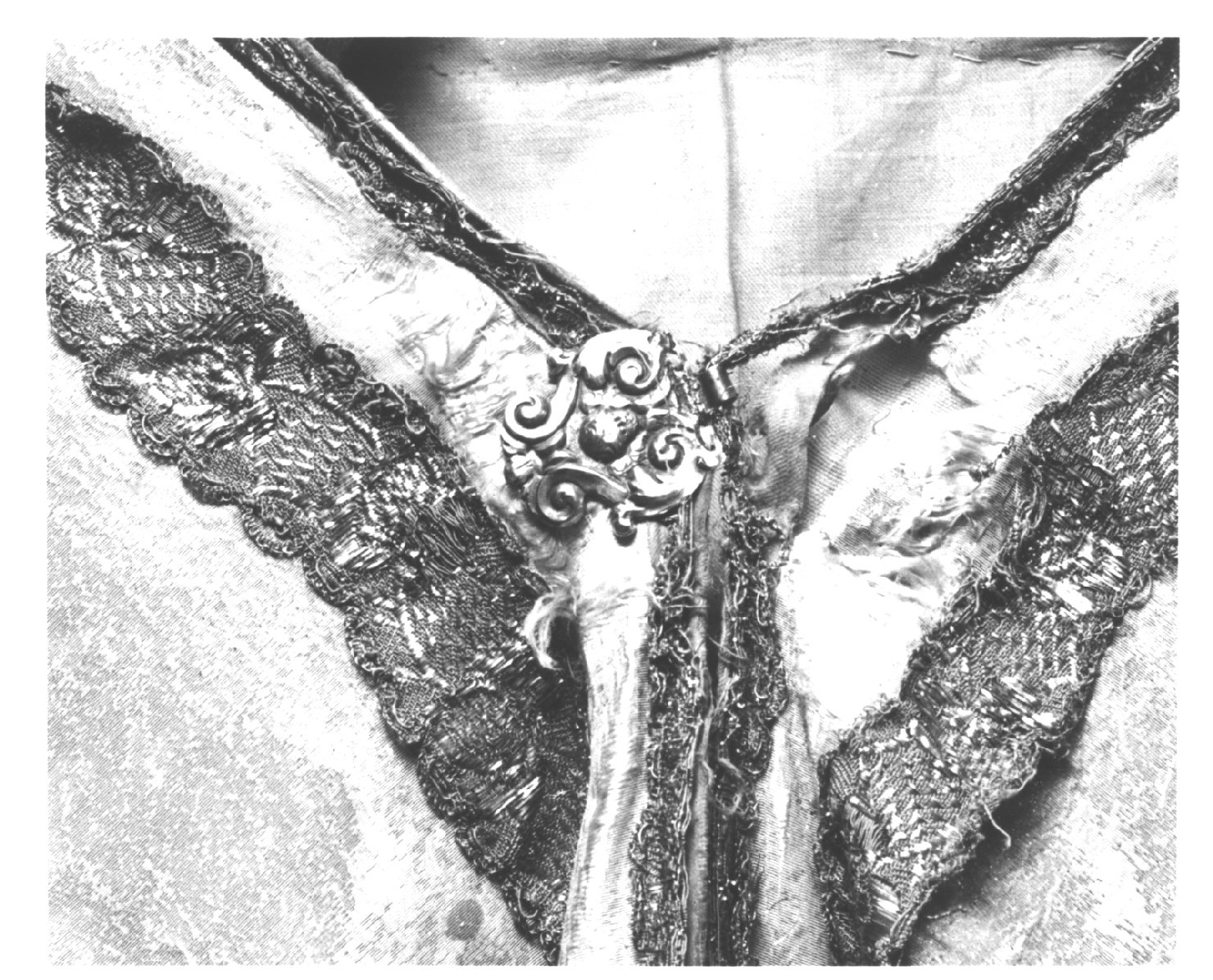 motivi decorativi a volute/ testa alata (fibbia, opera isolata) - bottega ligure (prima metà sec. XVIII)