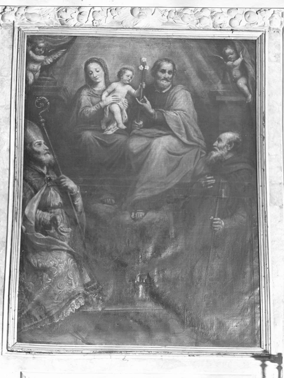 Sacra Famiglia con Sant'Eligio e San Antonio Abate (dipinto, opera isolata) di Fiasella Domenico detto Sarzana (sec. XVII)