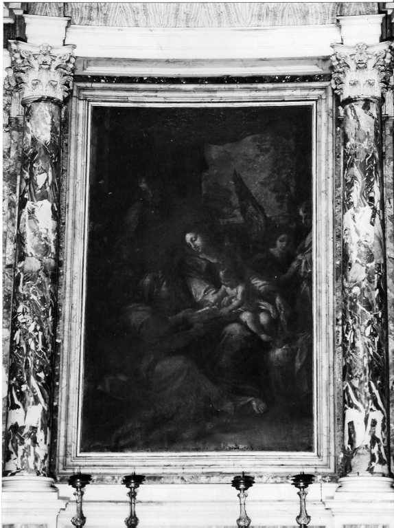 Madonna con Bambino che porge un cartiglio a Sant'Anna tra San Giuseppe e angeli (pala d'altare) di Berrettoni Nicolò (sec. XVII)