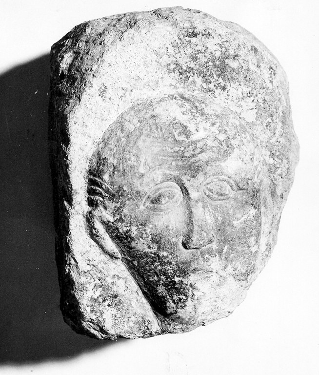 testa di uomo (scultura, frammento) - ambito laziale (secc. XI/ XII)
