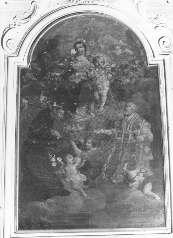 Madonna del Carmelo con Sant'Antonio da Padova e San Filippo Neri (pala d'altare) di Manenti Vincenzo (attribuito) (sec. XVII)