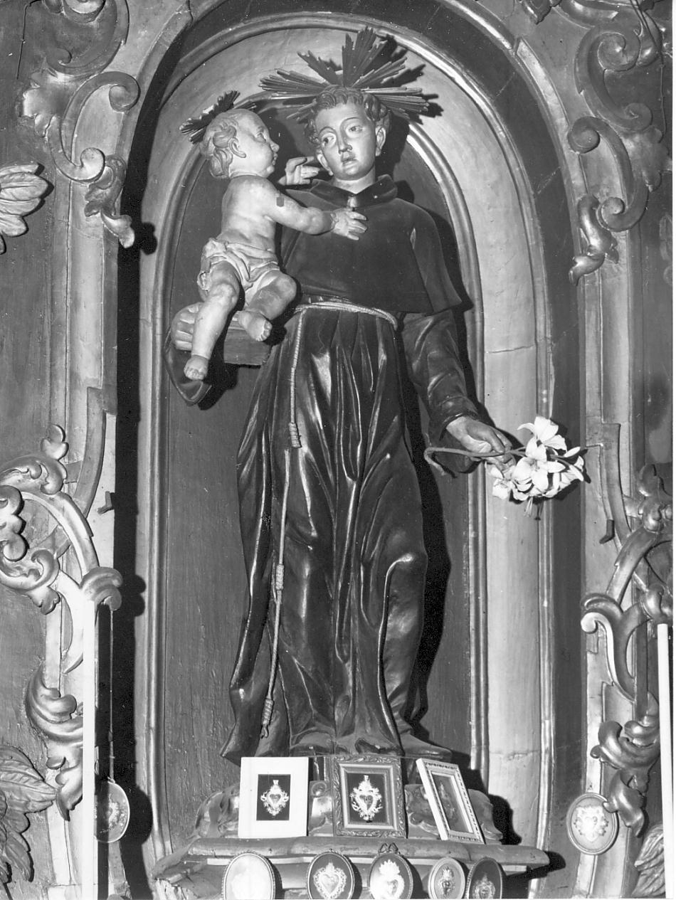 Sant'Antonio da Padova con il bambino (statua) di Bertesi Giovan Giacomo (bottega) (seconda metà sec. XVII)