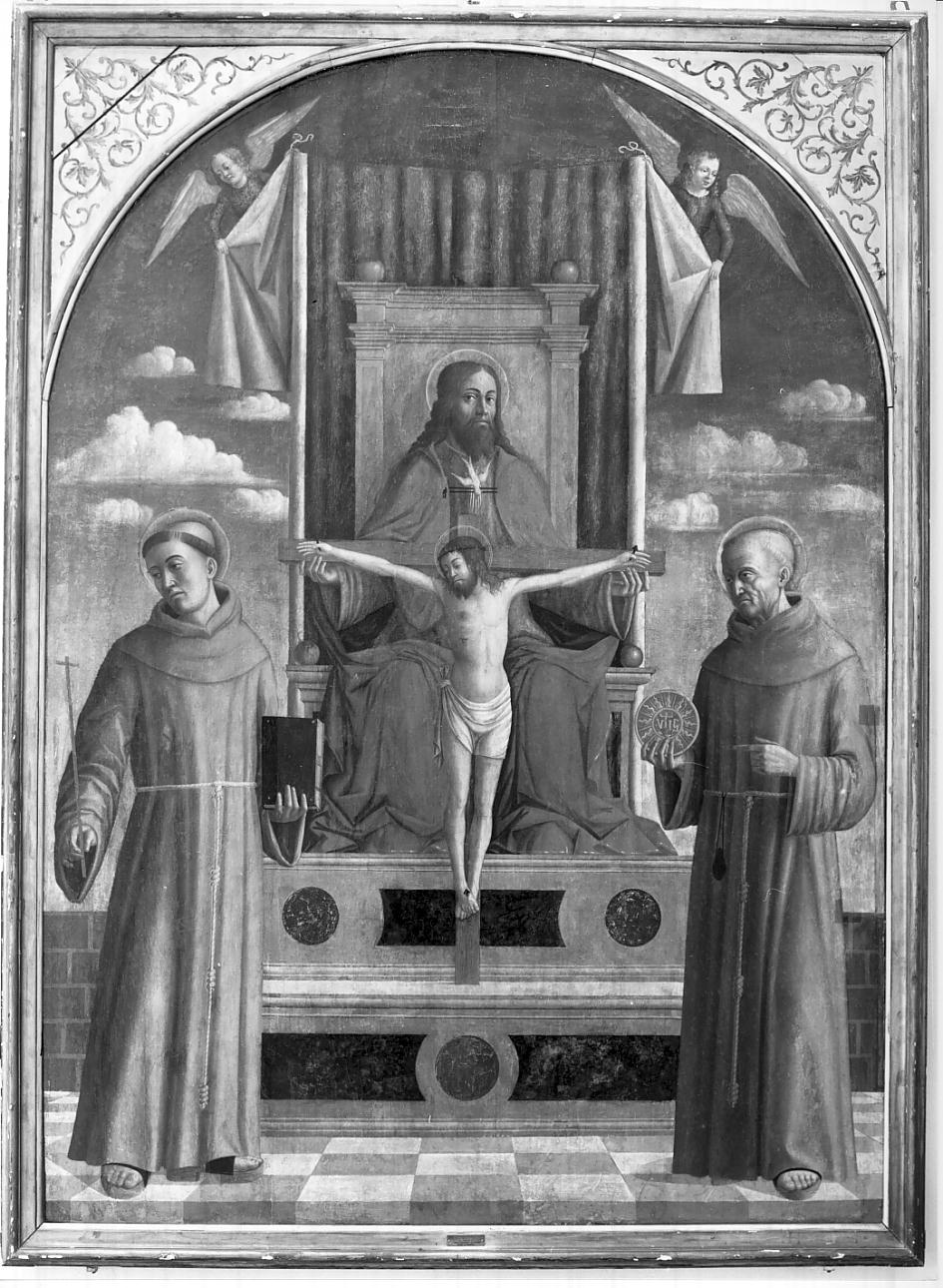 Trinità con San Francesco e San Bernardino (dipinto, opera isolata) di Mansueti Giovanni (fine sec. XV)