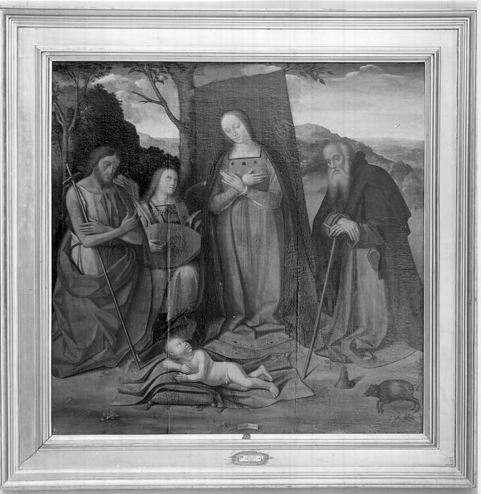 Madonna adorante il Bambino con San Giovanni Evangelista Sant'Antonio Abate e un angelo (dipinto, opera isolata) di Aleni Tommaso detto Fadino (sec. XVI)