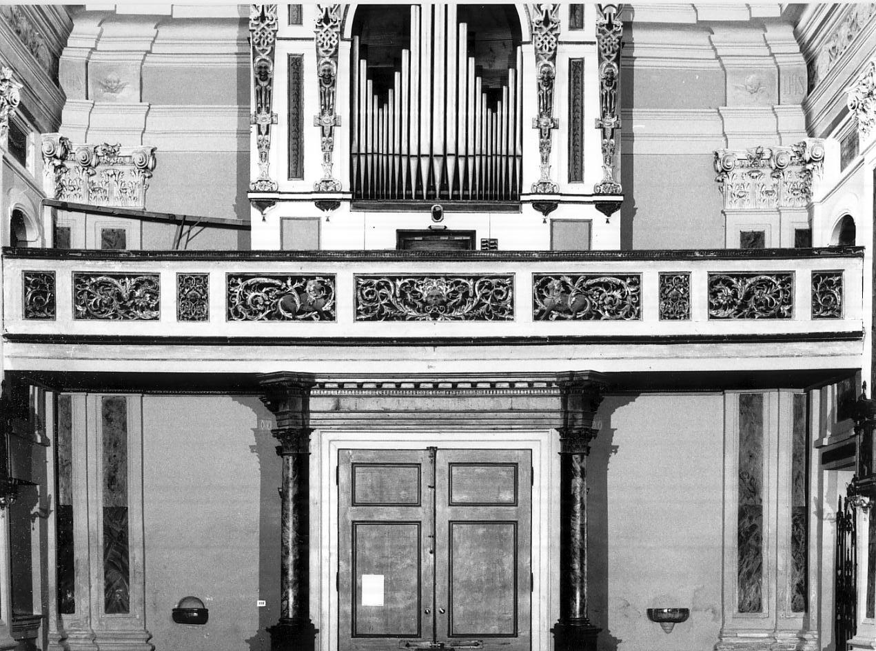 animale fantastico (sfinge)/ motivi decorativi fitomorfi/ mascherone/ testine (formella, elemento d'insieme) - ambito bresciano (?) (seconda metà sec. XVI)