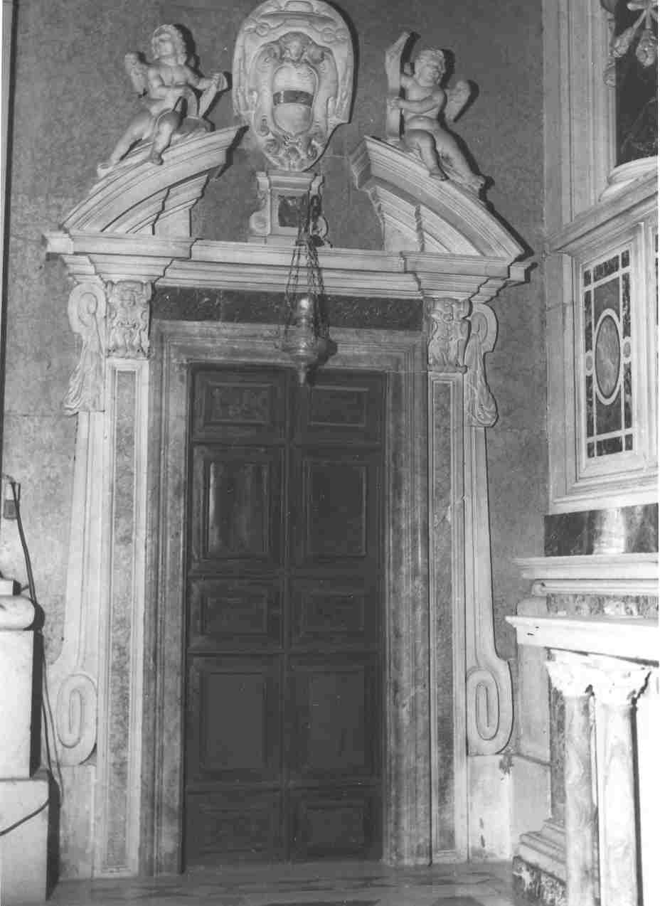 mostra di porta, coppia di Carra Giovanni, Carrà Carlo (sec. XVII)