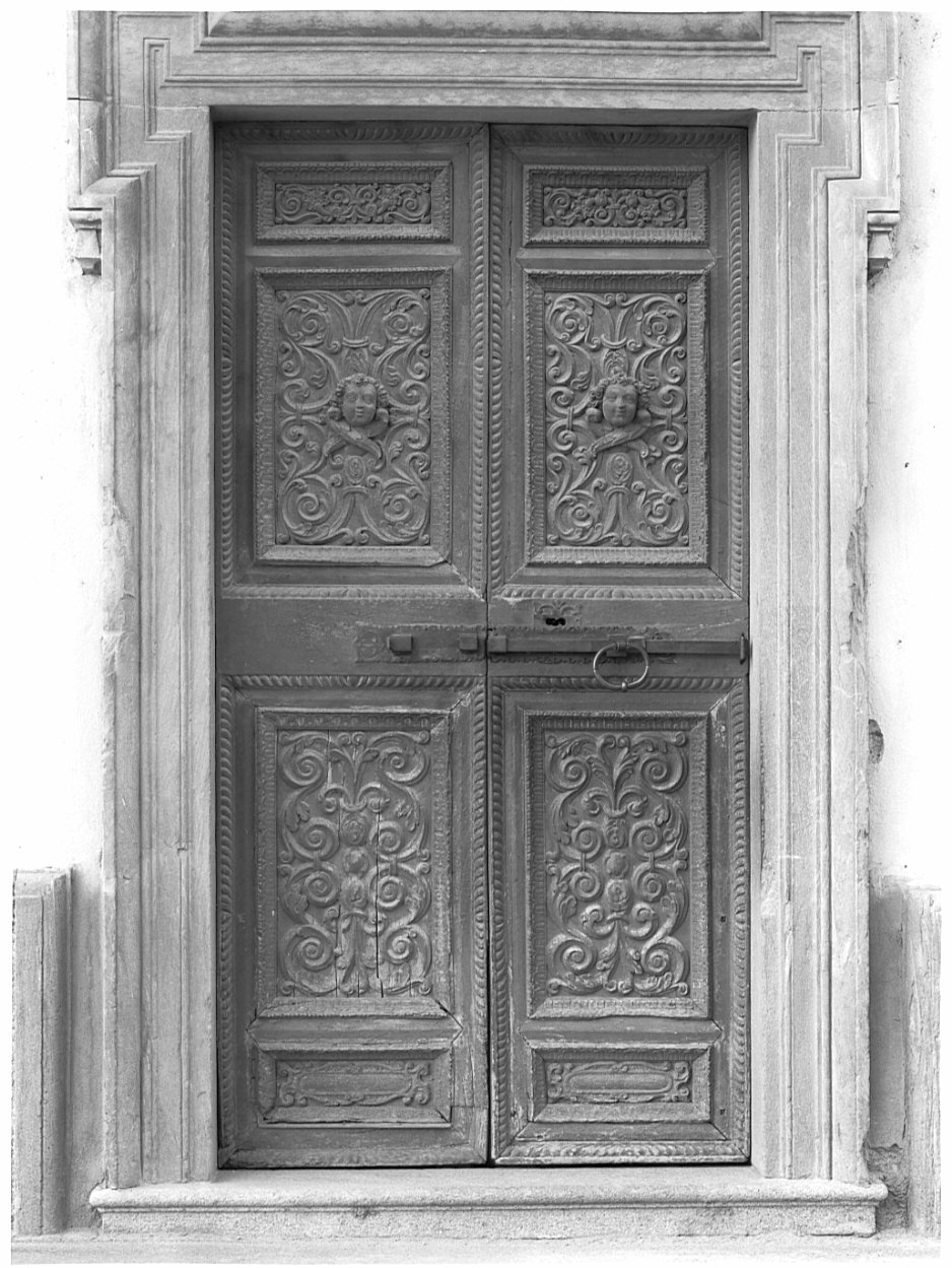 porta - a due battenti, opera isolata di Pietro di Cepina, Della Rocca G (sec. XVII)