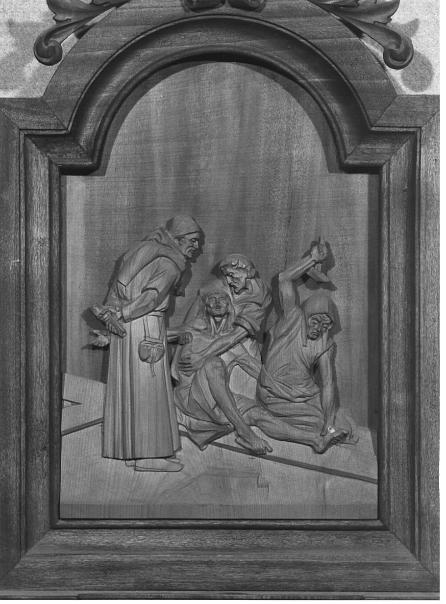 stazione XI: Gesù inchiodato alla croce (formella, elemento d'insieme) di Sandrini Martino (sec. XX)