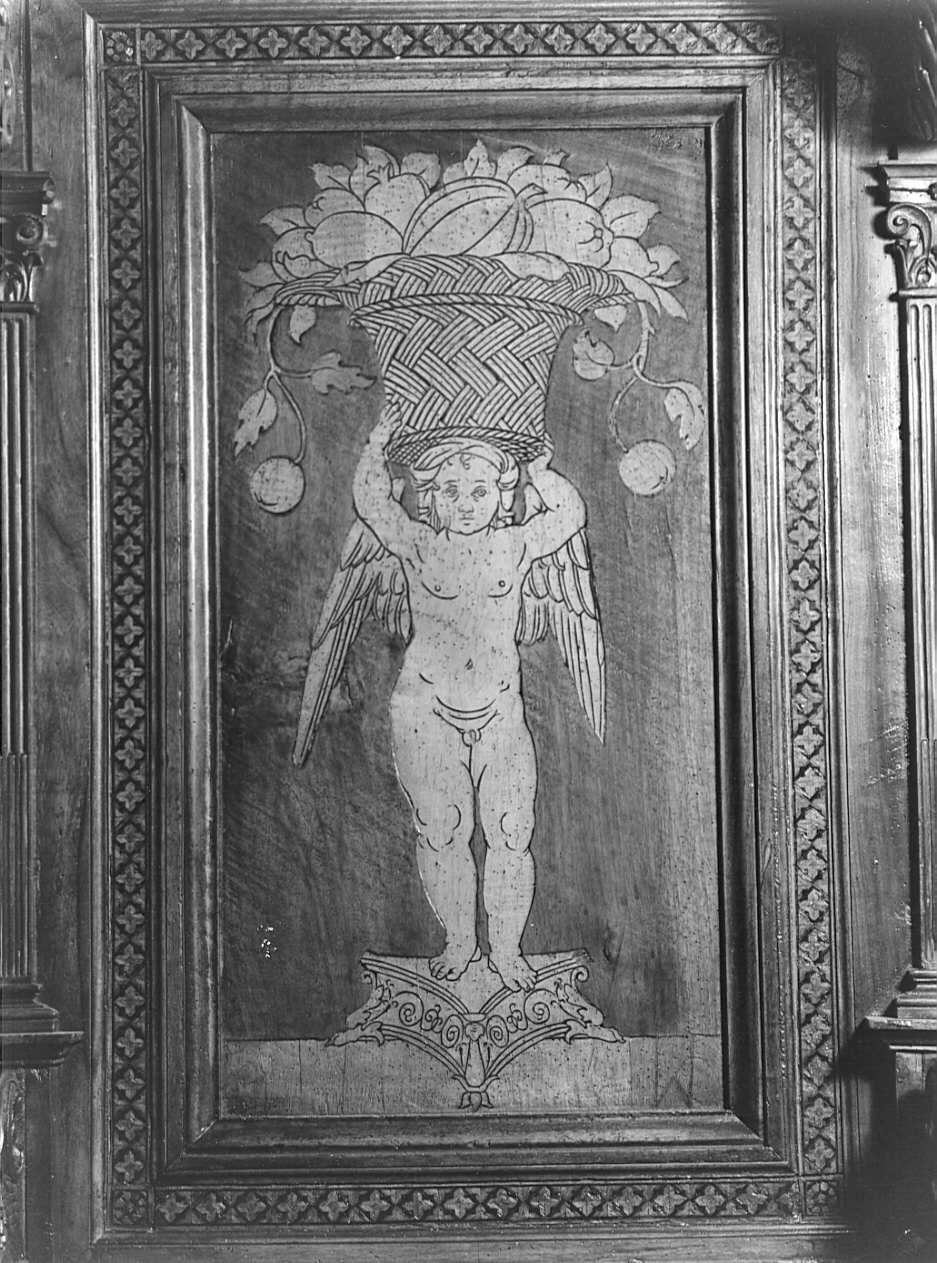 angelo con canestro di frutta (schienale di stallo di coro, elemento d'insieme) di Giramo Francesco (sec. XVI)