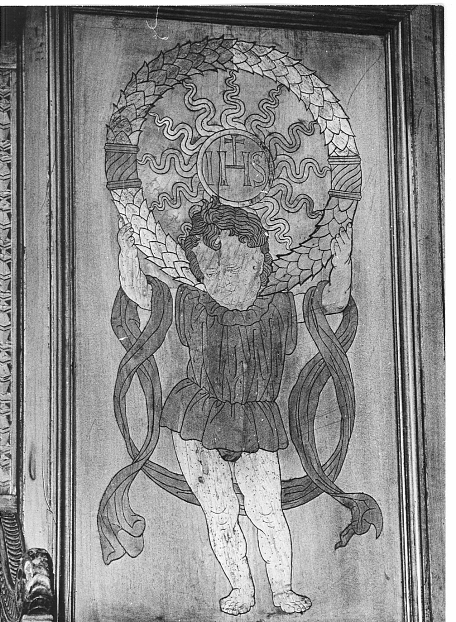 putto con monogramma di Cristo (pannello di stallo di coro, elemento d'insieme) di Butinone Bernardino (attribuito), Zenale Bernardino (attribuito) - bottega lombarda (secc. XV/ XVI)