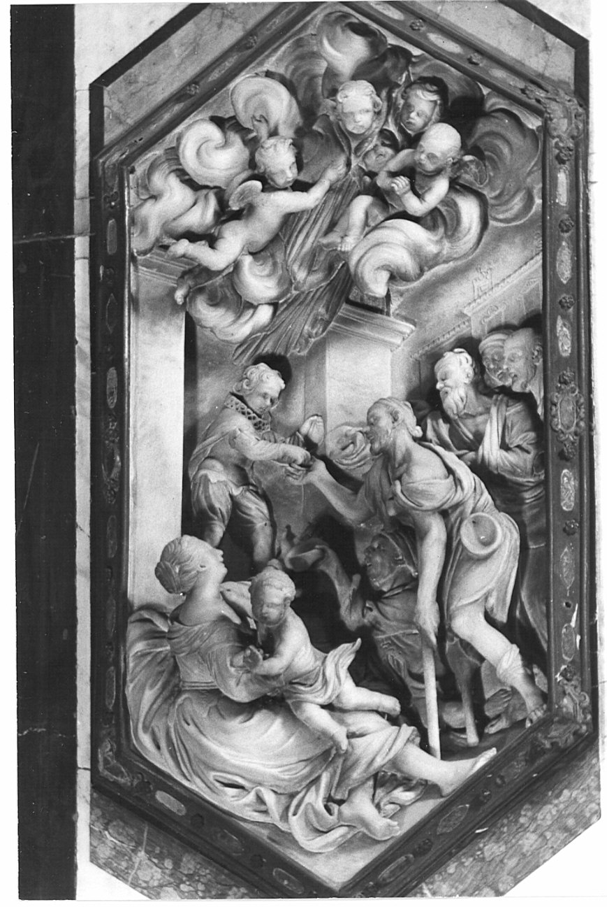 San Gaetano da Thiene fanciullo distribuisce l'elemosina (rilievo, elemento d'insieme) di Rusnati Giuseppe (seconda metà sec. XVII)