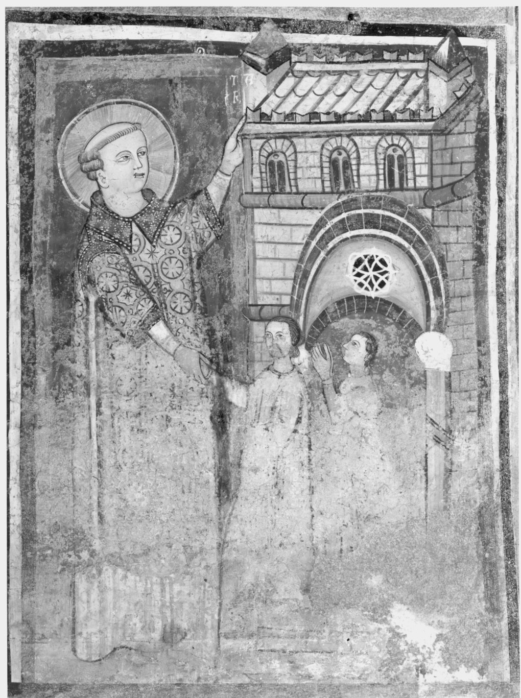 Santo in atto di proteggere un edificio e due devoti (dipinto murale) - ambito lombardo (inizio sec. XIV)