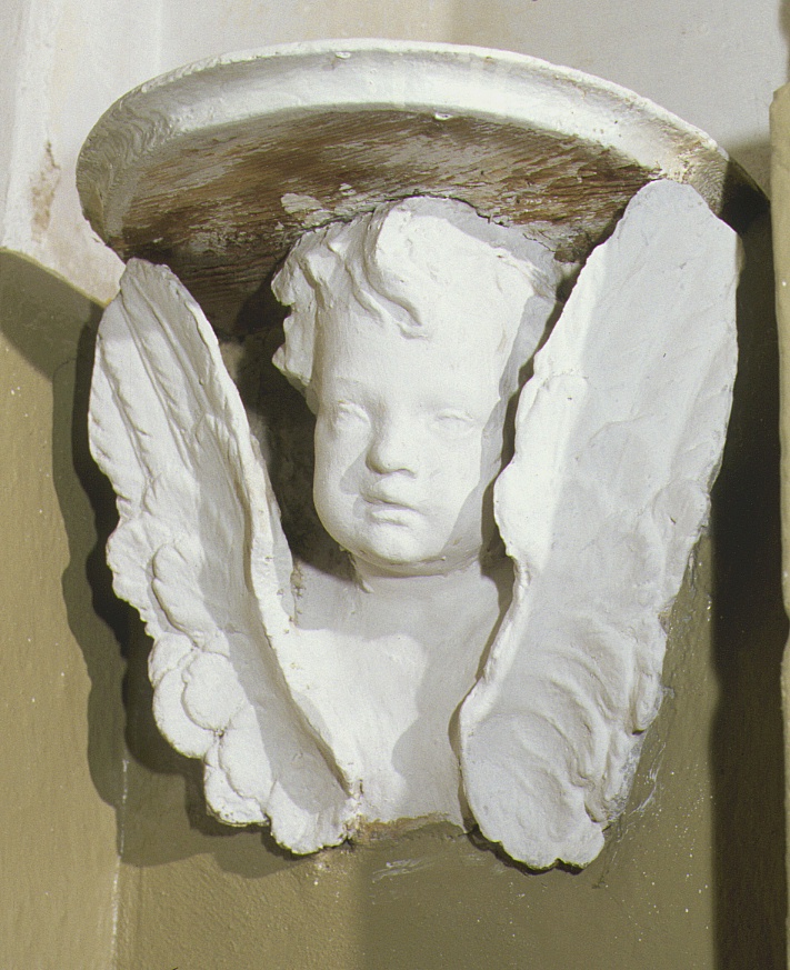 testa angelica (rilievo, serie) - ambito marchigiano (prima metà sec. XIX)