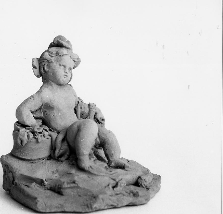 putto seduto (scultura) di Paci Emidio (sec. XIX)
