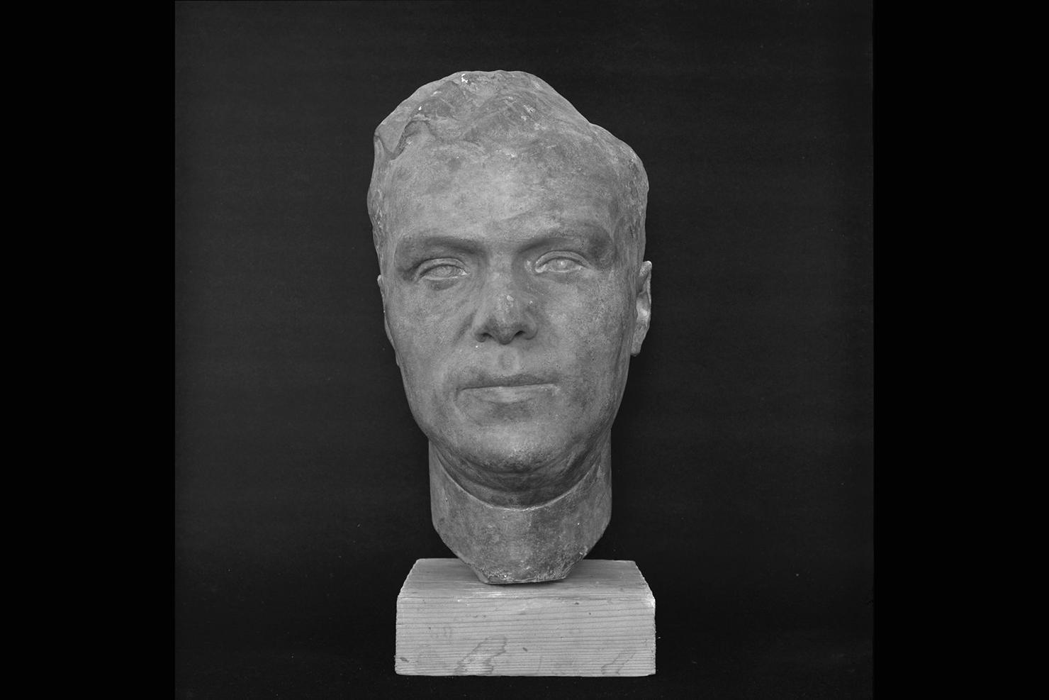 testa maschile (scultura) di Gera Uno (sec. XX)