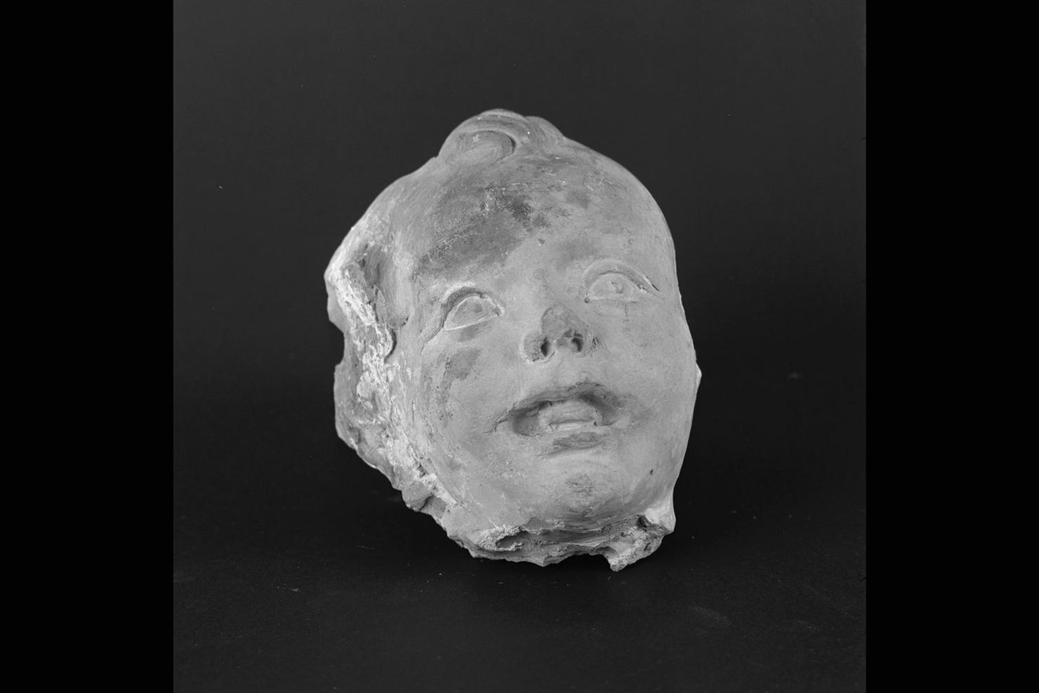 volto di putto (rilievo, frammento) di Della Robbia Mattia (sec. XVI)