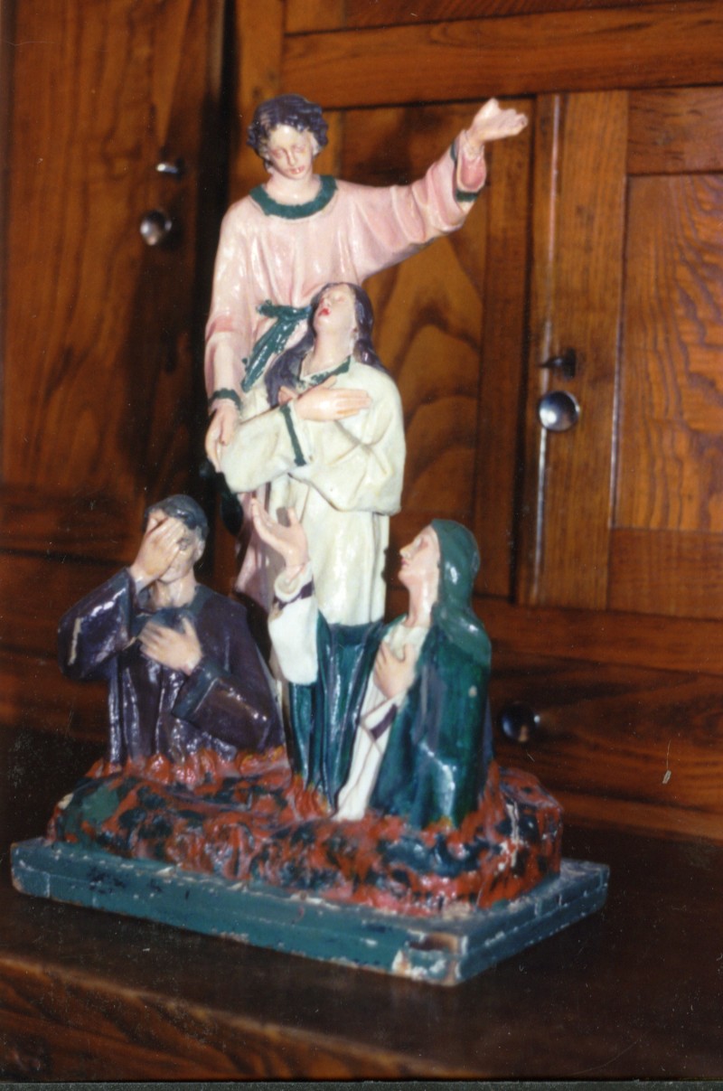 Anime del purgatorio tra le fiamme ed angelo che porta a salvezza (gruppo scultoreo)