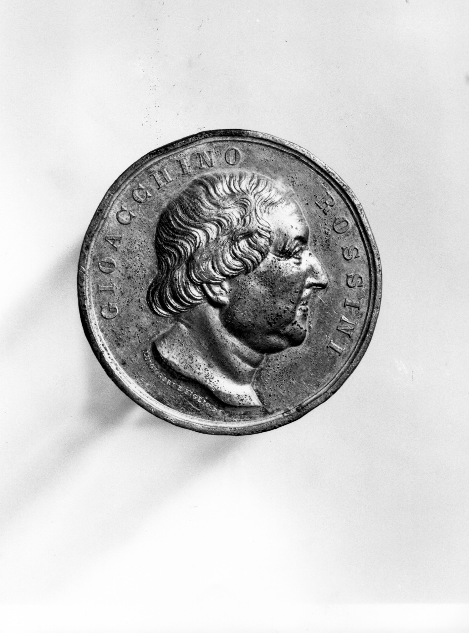 testa di Gioacchino Rossini (recto)// corona d'alloro (verso) (medaglia) di Gori Luigi (sec. XIX)