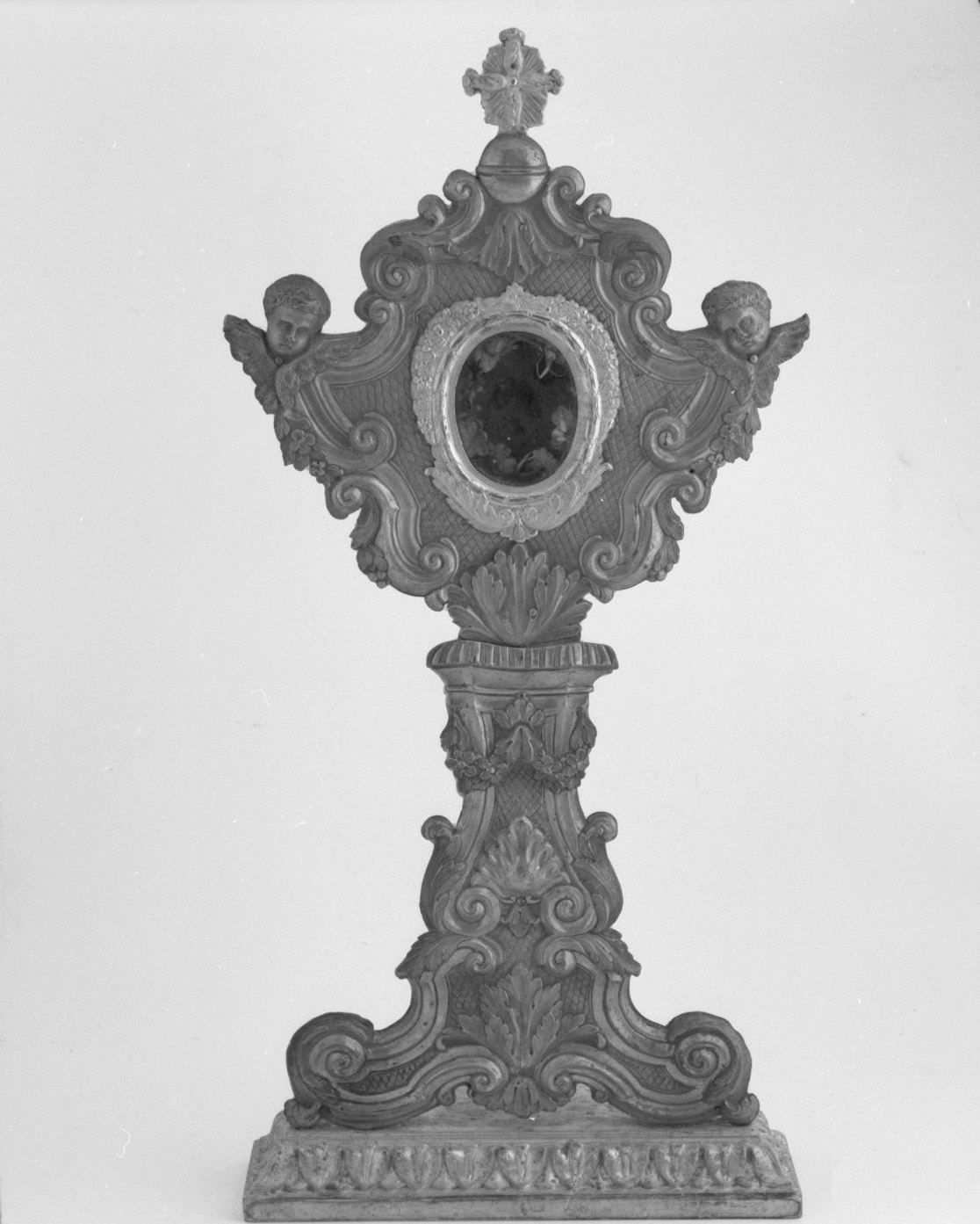 cherubini e motivi decorativi fitomorfi (reliquiario - a ostensorio) - bottega toscana (secc. XVIII/ XIX)