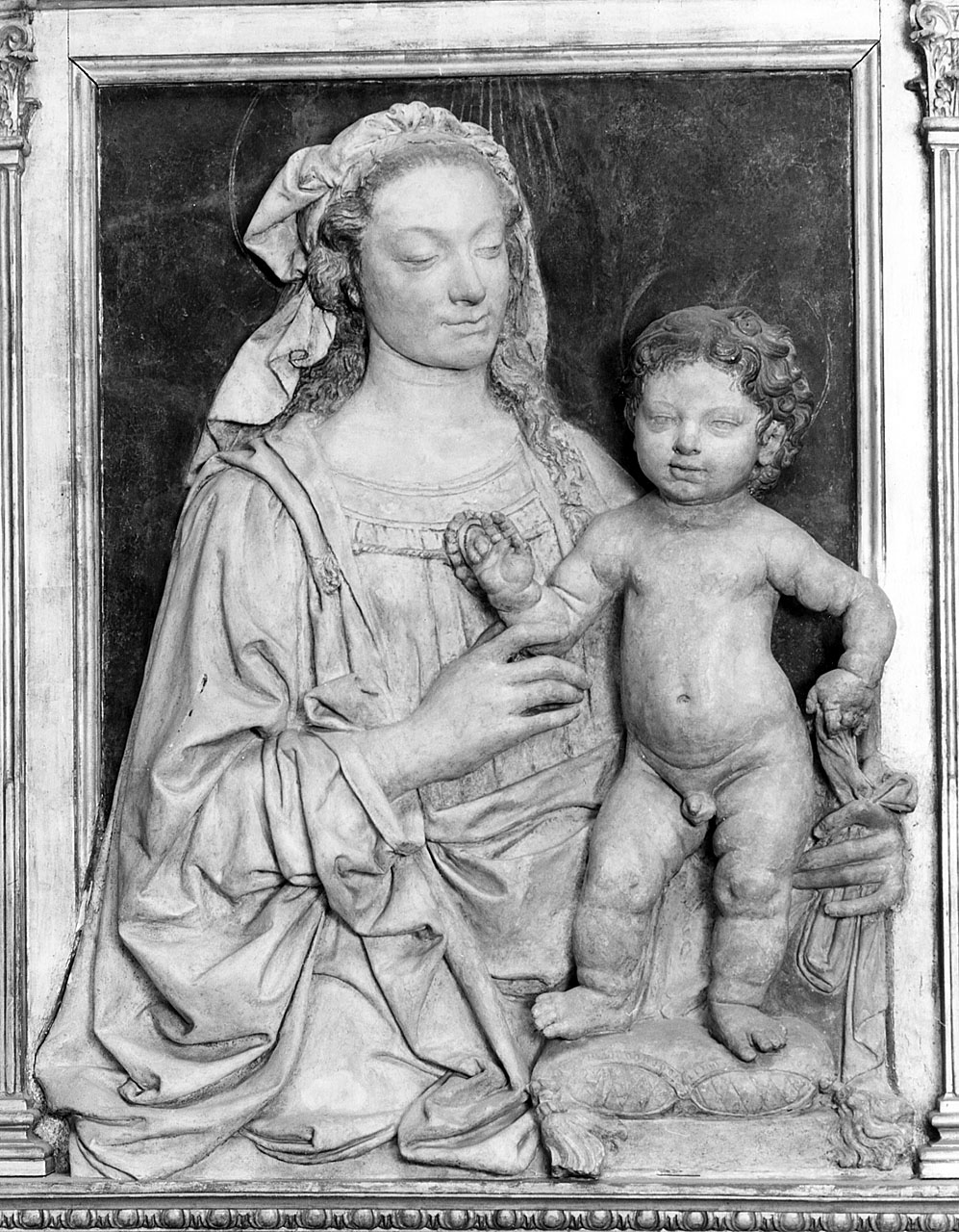 Madonna di Santa Maria Nuova, Madonna con Bambino (rilievo) di Cioni Andrea detto Verrocchio (sec. XV)