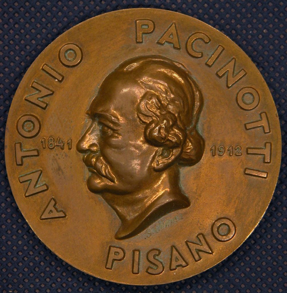 Diritto: Busto di Antonio Pacinotti; Rovescio: Anello di Pacinotti (medaglia, opera isolata) di Cenni G, Picchiani, Barlacchi (sec. XX)