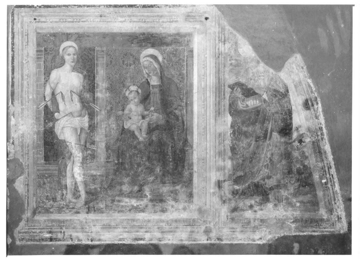 Madonna con Bambino e San Sebastiano (dipinto, elemento d'insieme) di Giovanni di Pietro detto Spagna (scuola) (sec. XVI)