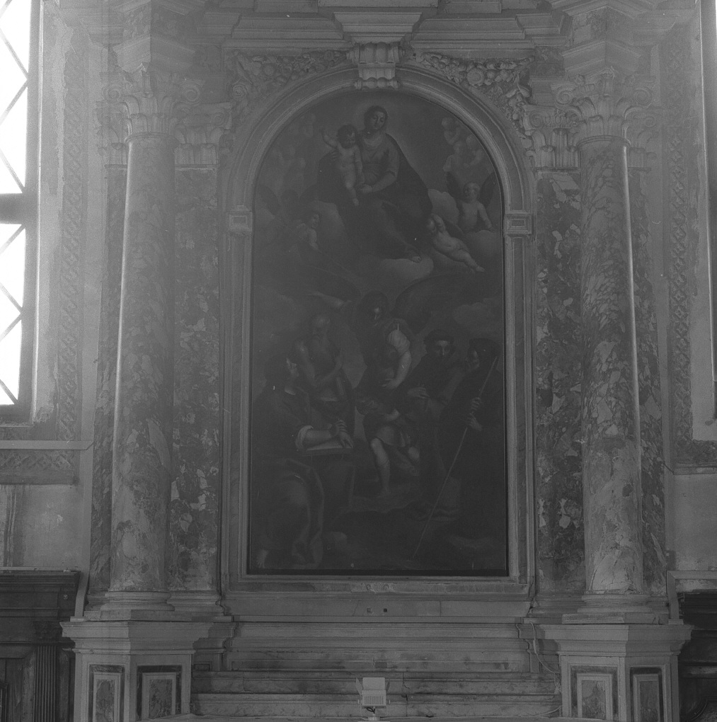 Madonna col Bambino in gloria e i Santi Giovanni Evangelista, Gerolamo, Francesco d'Assisi e Francesco da Paola,Tobia e l'Angelo (dipinto) di Negretti Jacopo detto Palma il Giovane (sec. XVII)