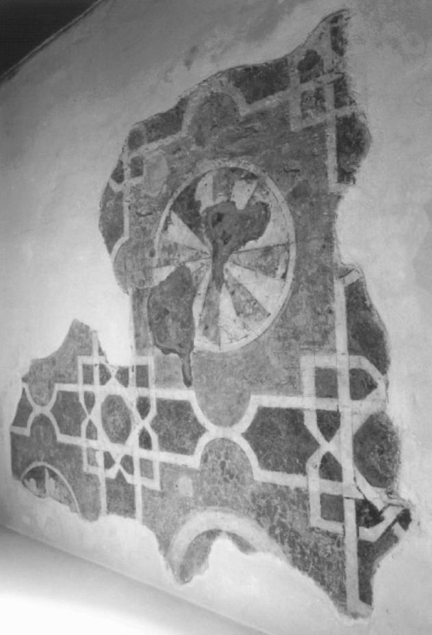 motivo decorativo a finti marmi intarsiati e tondi con ruote (dipinto, frammento) - ambito veneto (sec. XIV)