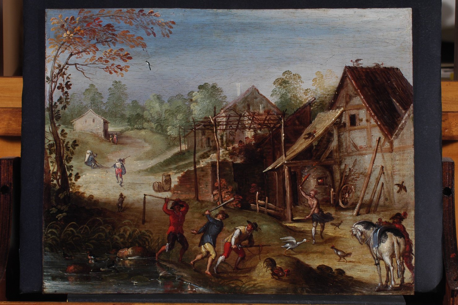 contadini che bastonano un soldato, paesaggio (dipinto) - bottega fiamminga (sec. XVII)