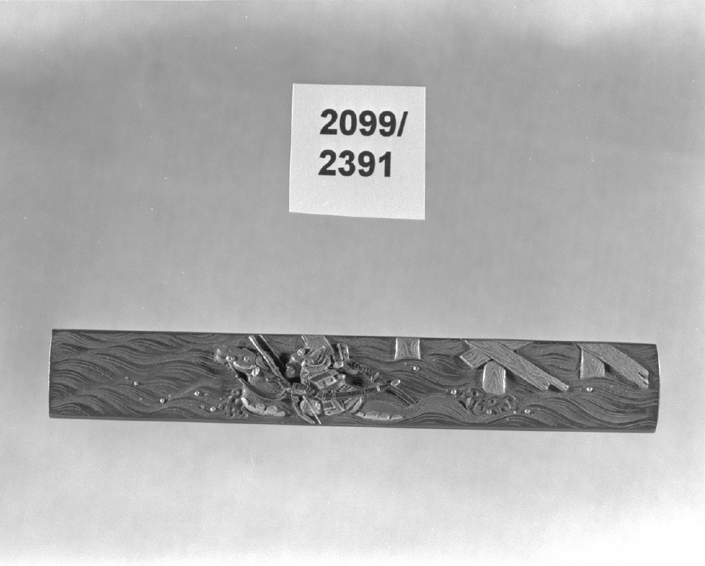 figura maschile (impugnatura di arma bianca, opera isolata) - ambito giapponese (secc. XVI/ XIX)