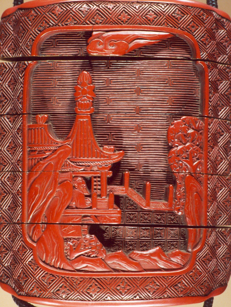 figure, pagode in paesaggio (inro, opera isolata) - ambito giapponese (secc. XVII/ XIX)